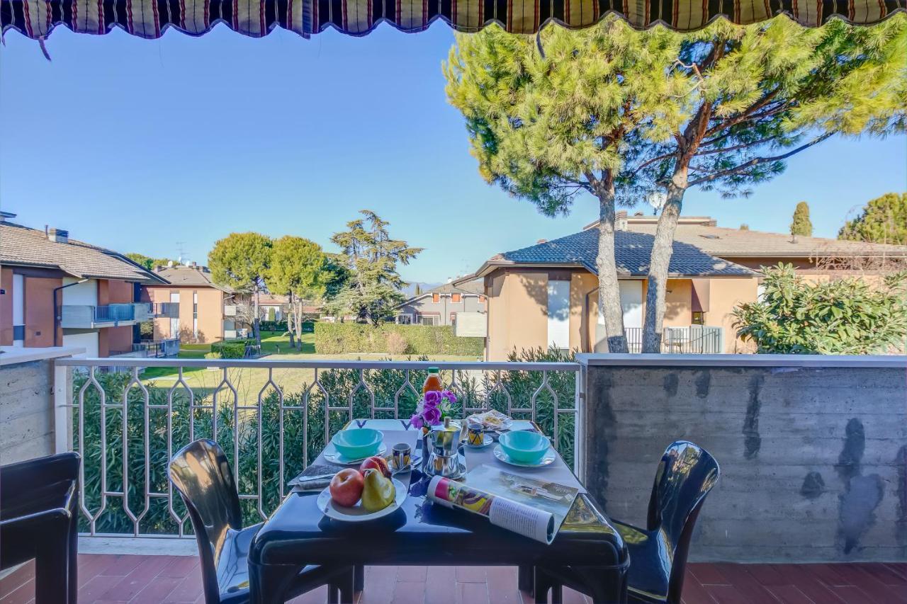Villa Fiorita Apartments - Happy Rentals 西尔米奥奈 外观 照片