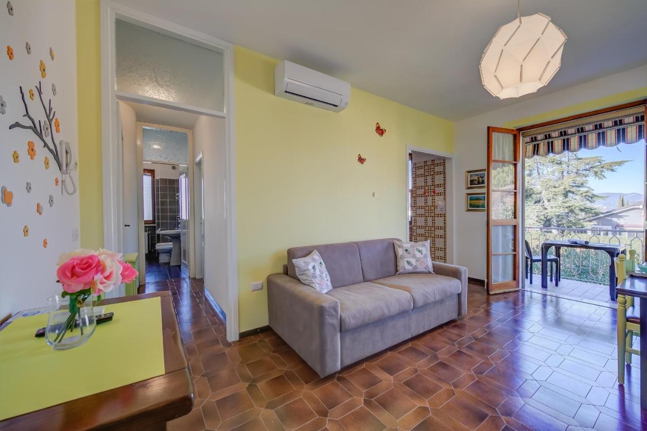 Villa Fiorita Apartments - Happy Rentals 西尔米奥奈 外观 照片