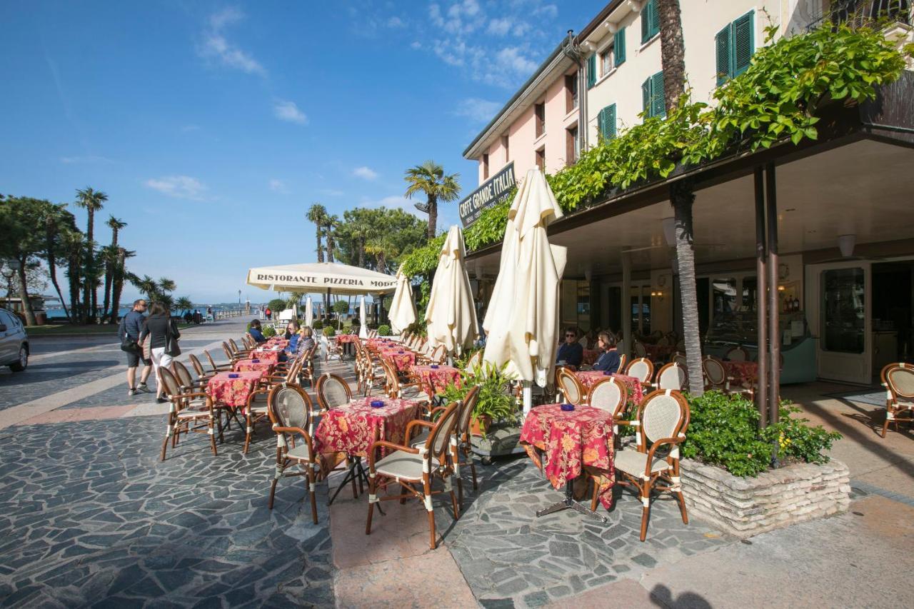 Villa Fiorita Apartments - Happy Rentals 西尔米奥奈 外观 照片