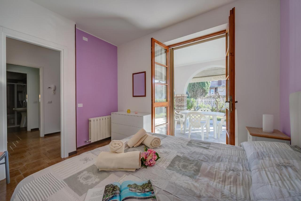 Villa Fiorita Apartments - Happy Rentals 西尔米奥奈 外观 照片