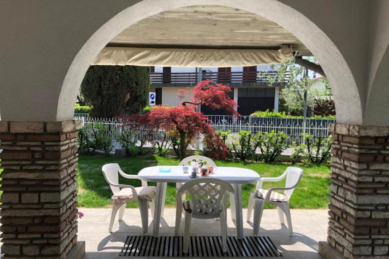 Villa Fiorita Apartments - Happy Rentals 西尔米奥奈 外观 照片